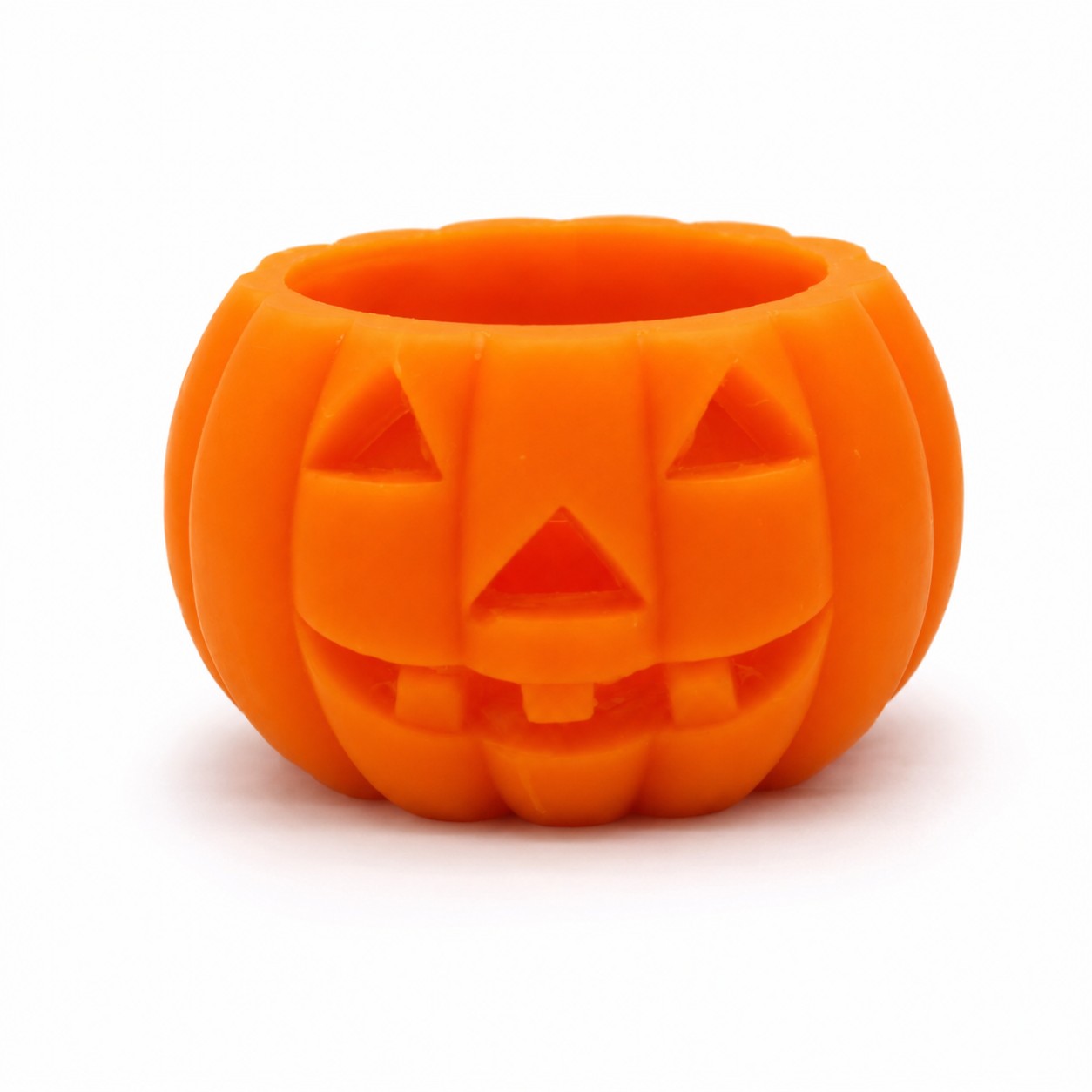 Oranje Halloween pompoen kaars van wax met uitgesneden gezicht